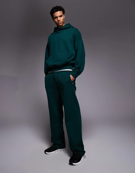  4505 Icon Rest Day Heavyweight 440gsm Cotton Wide Leg Jogger With Zip Pockets In Washed Bottle Green 