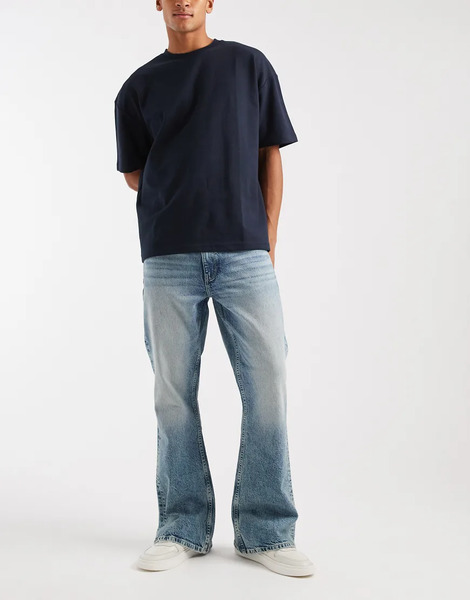  Asos Design Flared Jeans In Light Wash Blue 