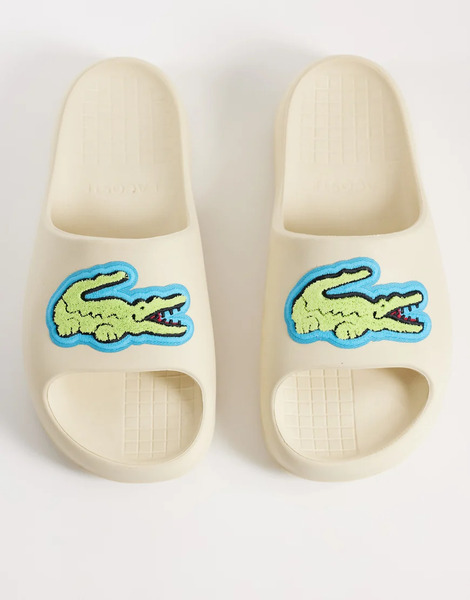  Lacoste Serve 2.0 Logo Sliders In Off White 