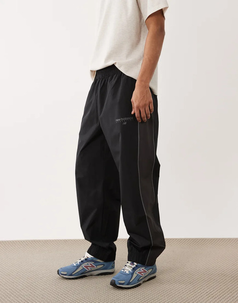  New Balance Trackside Woven Pant In Black 