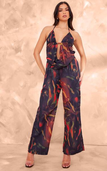  Prettylittlething Black Leaf Printed Cowel Detail Halter Neck Jumpsuit 