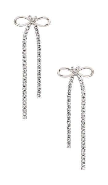  Shashi Bianca Bow Earring In Metallic Silver. 
